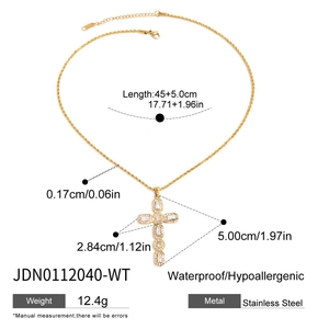 Detail view of gold stainless steel cross necklace with measurements and waterproof features