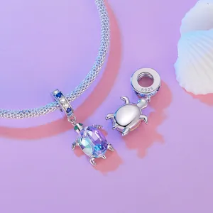Exquisite 925 sterling silver sea turtle pendant with vibrant purple-blue faceted stone