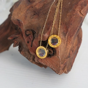 Luxury gold titanium steel round pendant necklace with Roman numerals and colorful gems