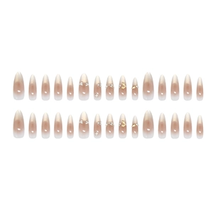 Elegant cat-eye press-on nails with almond shape, pearls, and butterfly charms