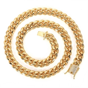 Detail view of gold-plated 12mm Cuban chain with diamond-encrusted buckle clasp