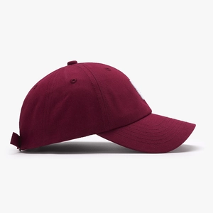Classic burgundy baseball cap with white NY embroidery and breathable cotton fabric