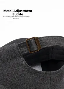 Detail of adjustable metal buckle on grey vintage baseball cap for a custom fit