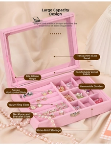 Pink velvet jewelry organizer with transparent glass lid and internal multi-compartment storage