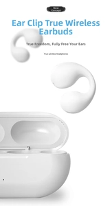 Close-up of white clip-on TWS earbuds with an ergonomic C-bridge design and charging case