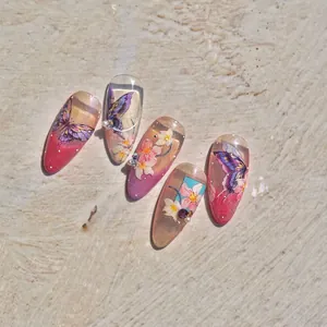 5 faux ongles amande avec papillons violets, fleurs et strass tridimensionnels