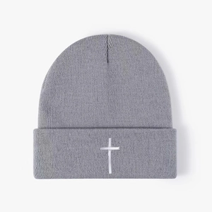 Unisex grey knitted beanie with white cross embroidery for outdoor winter warmth