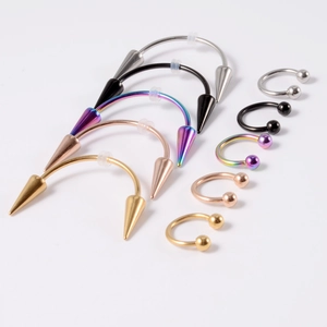 Set of surgical steel smiley piercing studs in various colors with cone and ball ends