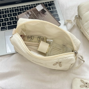Quilted rabbit embroidery cosmetic bag interior view showing large storage capacity