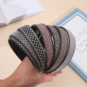 Detailed view of various colorful rhinestone headbands with high-shine crystal embellishments