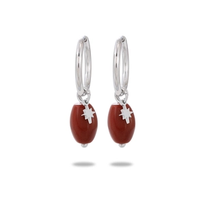 Detail of silver octagonal star earrings with oval deep red natural stone drops