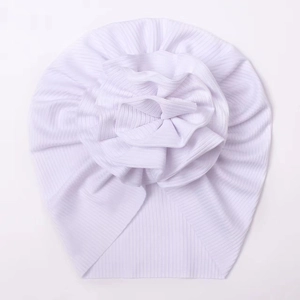 Detail of lavender striped ice silk baby turban hat with a layered fabric flower decoration
