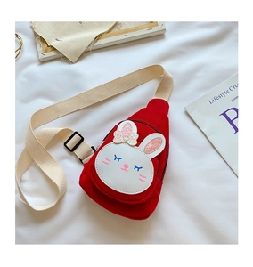 Detail of red rabbit canvas chest bag for kids with sequin bow on white background