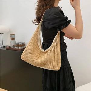 Khaki woven straw shoulder bag for women with minimalist hobo silhouette and large capacity