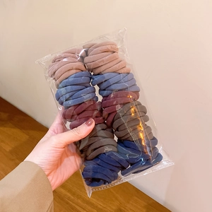 Assorted colors of high-elasticity hair ties in neutral tones for daily hair styling