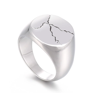 Mens silver stainless steel wide ring featuring a modern minimalist cracked pattern design
