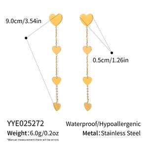 Detailed view of long stainless steel heart tassel earrings with dimensions measuring 9cm