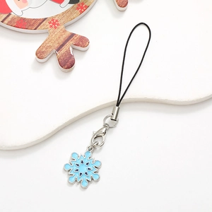 Detail view of blue and silver snowflake pendant with black lanyard and metal clasp