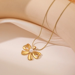 Gold-plated bow necklace with pearl pendant on a sleek snake chain for women