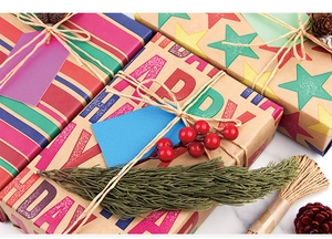 Detail of Happy Birthday kraft wrapping paper with colorful stripes and hemp rope set