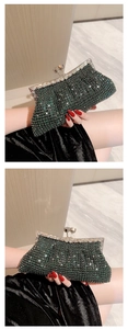 Detailed view of dark green rhinestone evening bag held by model against velvet dress
