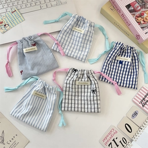 5-piece set of striped and checkered cotton drawstring storage bags for travel organization