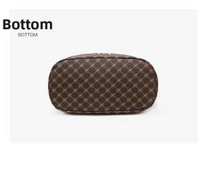 Detailed bottom view of brown patterned crossbody bag showing leather texture and logo print