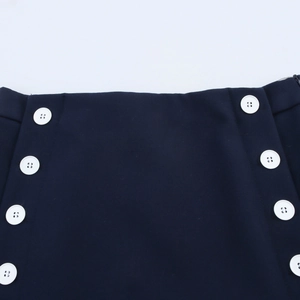 Navy blue A-line mini skirt with decorative double-breasted white buttons on the waist