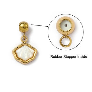 Macro detail of gold-plated shell pendant with rubber stopper inside for DIY jewelry