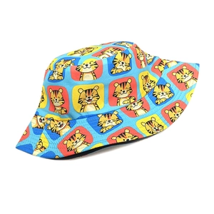 Sky blue bucket hat with cartoon tiger prints and colorful squares for outdoor travel
