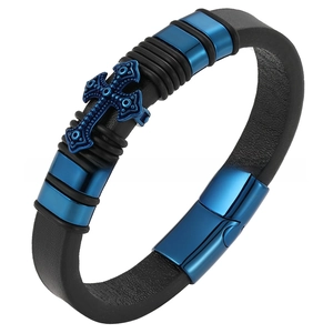 Detail of blue electroplated cross and textured black leather cord for men's bracelet