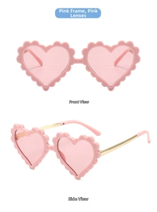 Rosafarbene Herz-Sonnenbrille für Kinder mit Wellenrand und goldenen Metallbügeln