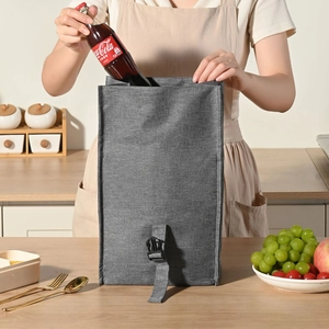 Deep grey insulated lunch bag with buckle closure and adjustable strap for large capacity