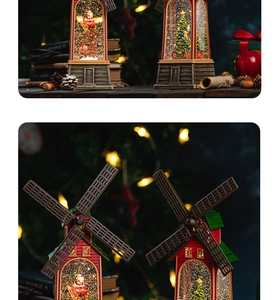 Detail of Santa Claus and Christmas tree inside a lighted windmill lantern music box