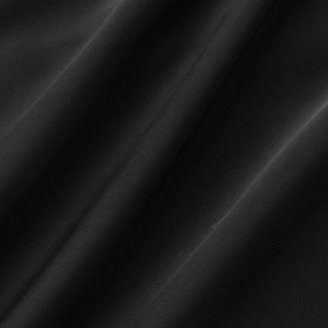 Close-up of premium black fabric texture with subtle fine diagonal twill weave