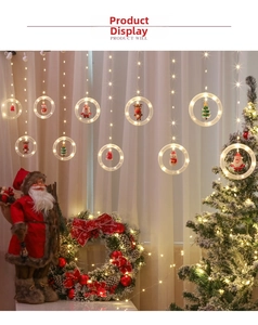 Detail view of 10-ring LED curtain lights with Santa and Reindeer figures in warm white light