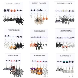 Detailed collection of Halloween earrings featuring pumpkins, ghosts, and bats icons