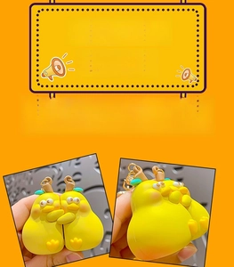 Close-up of creative pear-shaped ducks in a hug made of soft silicone material