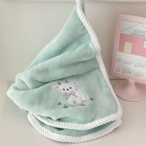 Thick light green lamb fleece towel with cute lamb embroidery and braided edge