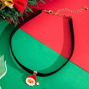 Detail of Santa Claus pendant on black velvet choker with adjustable gold lobster clasp
