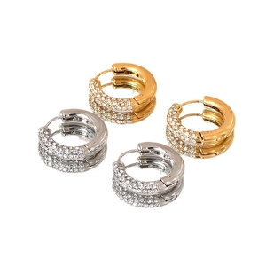 Chic punk style round hoop earrings with micro-paved zircons in gold and silver finish