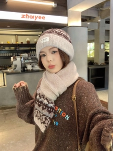 Close-up of Fair Isle knit hat with vintage nordic jacquard pattern and thick texture