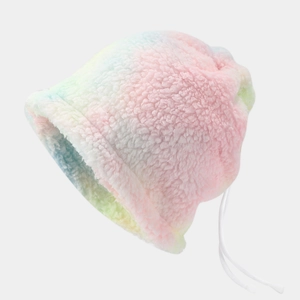 Detailed macro view of soft tie-dye fleece beanie with pastel macaron gradient texture