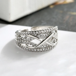 Elegant infinity silver ring with cubic zirconia micro-paving and adjustable open design