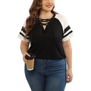 Detail of plus size V-neck T-shirt with black and white contrast sleeves and lace-up neck
