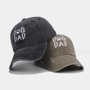Unisex washed cotton baseball caps in charcoal and olive with Dog Dad embroidery