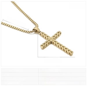 Detail of gold stainless steel cross necklace showing wheat texture and box chain specs