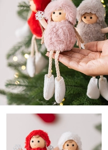 Detail of plush Christmas girl doll with sequins snowflake for tree decoration