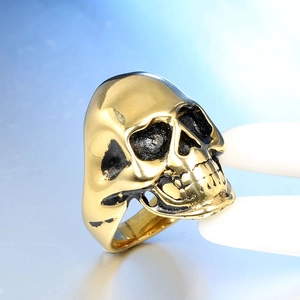 Polished gold punk skull ring for men, detailed view of gothic stainless steel design