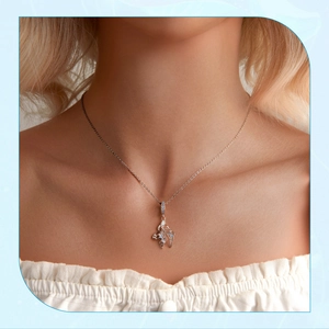 Elegant s925 sterling silver fighting fish necklace with blue opal inlay on female model